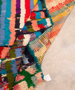 Embrace the beauty of upcycling with our Mira Boucherouite rug – a piece that's not just a floor covering, but a tapestry of Moroccan heritage, sustainability, and vibrant storytelling